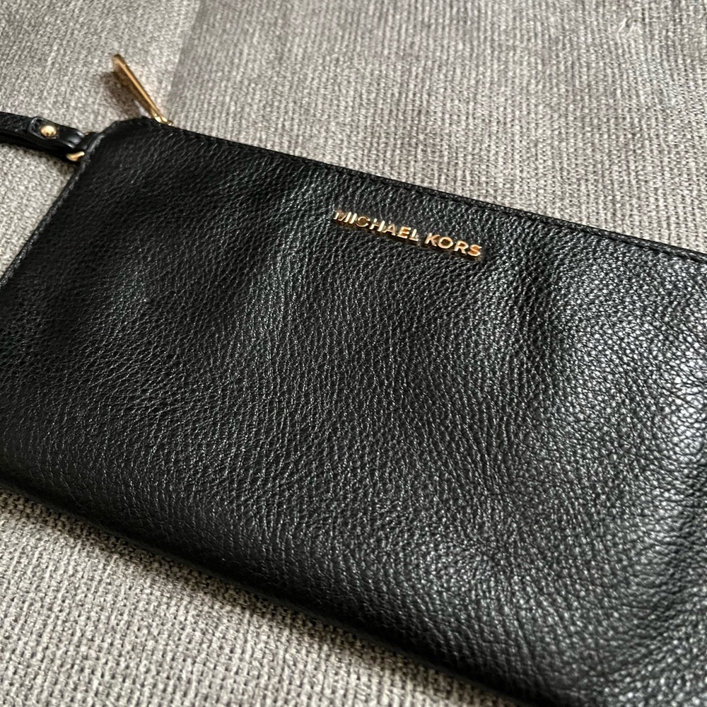 Authentic Michael Kors Black large wristlet.